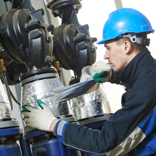 industrial worker at insulation work